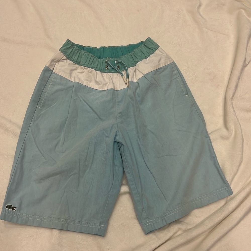 Boys size 12 Lacoste swim trunks.